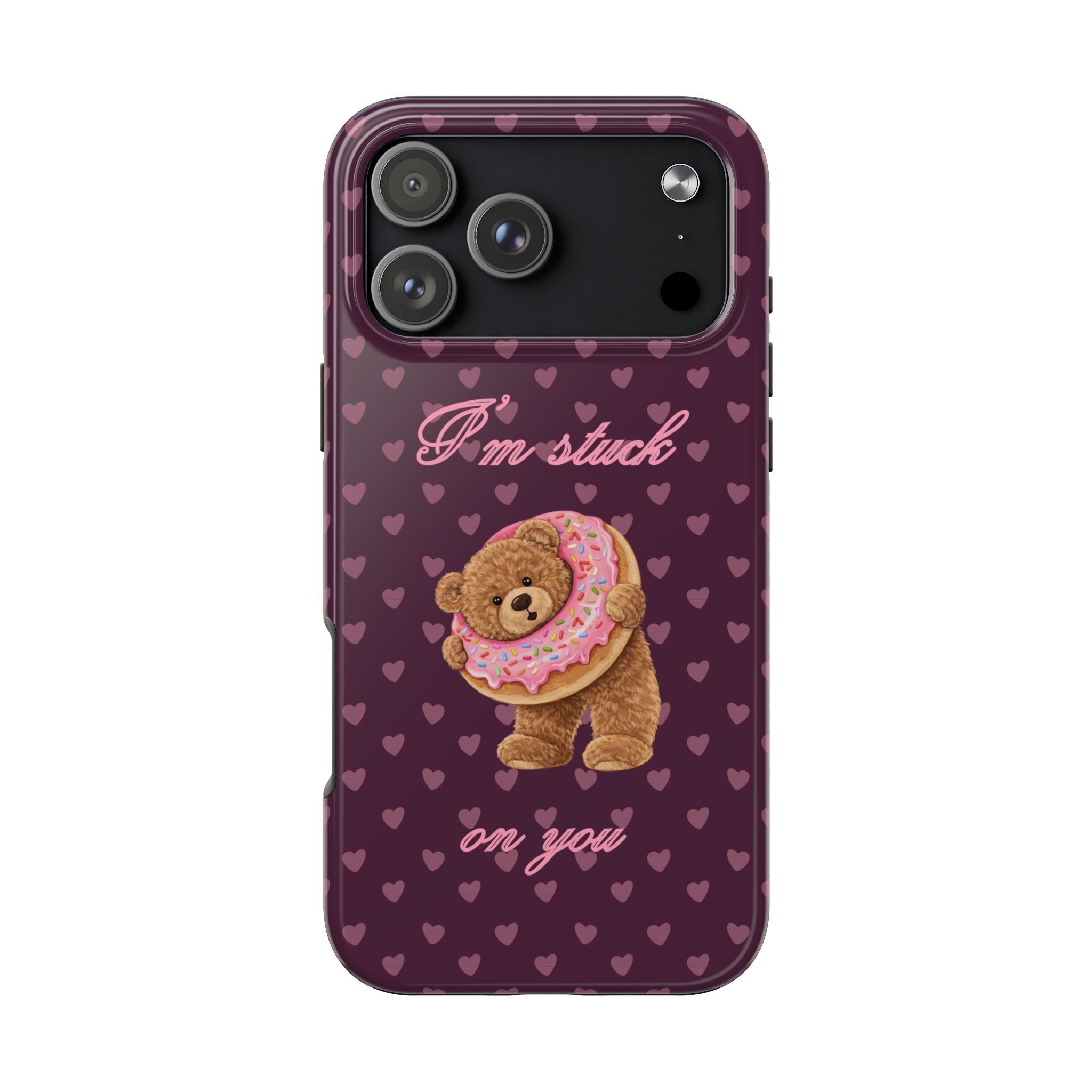 Purple teddy bear phone case with hearts, donut bear graphic, “I’m stuck on you” text