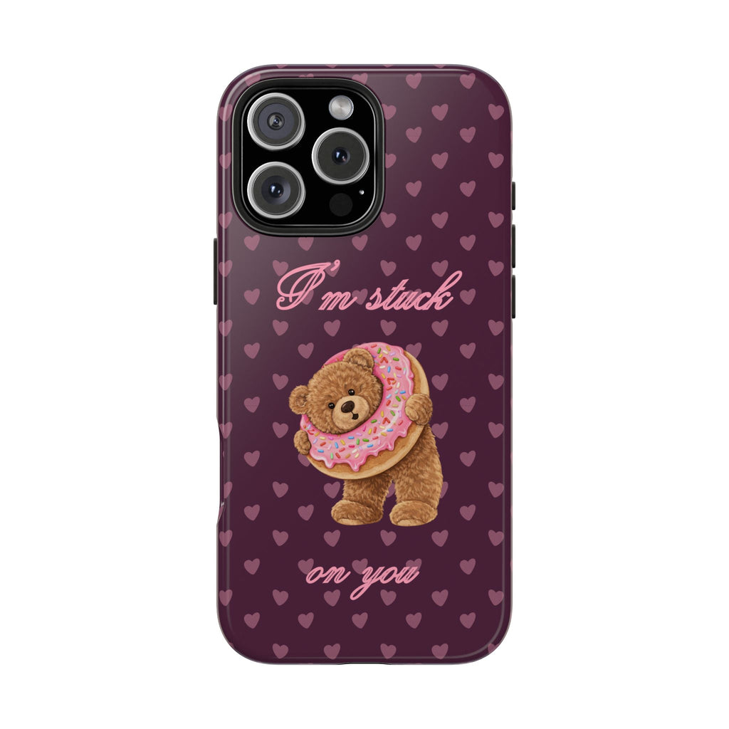 Purple teddy bear phone case with hearts, donut bear artwork and “on you” slogan
