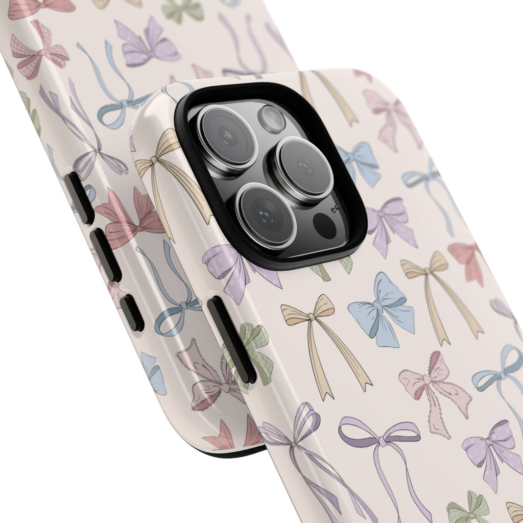 Pastel ribbon bow phone case with raised camera bump and side grip openings