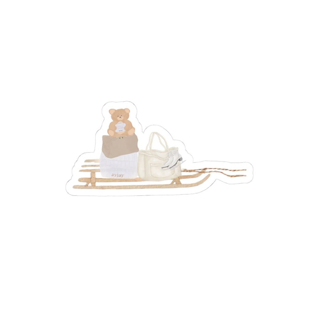 Bear on nightstand with white shelf accessories and small shoes sticker
