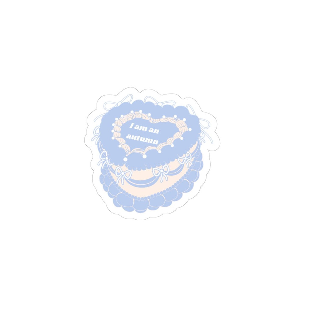 “I am an autumn” cake sticker in blue with ornate border