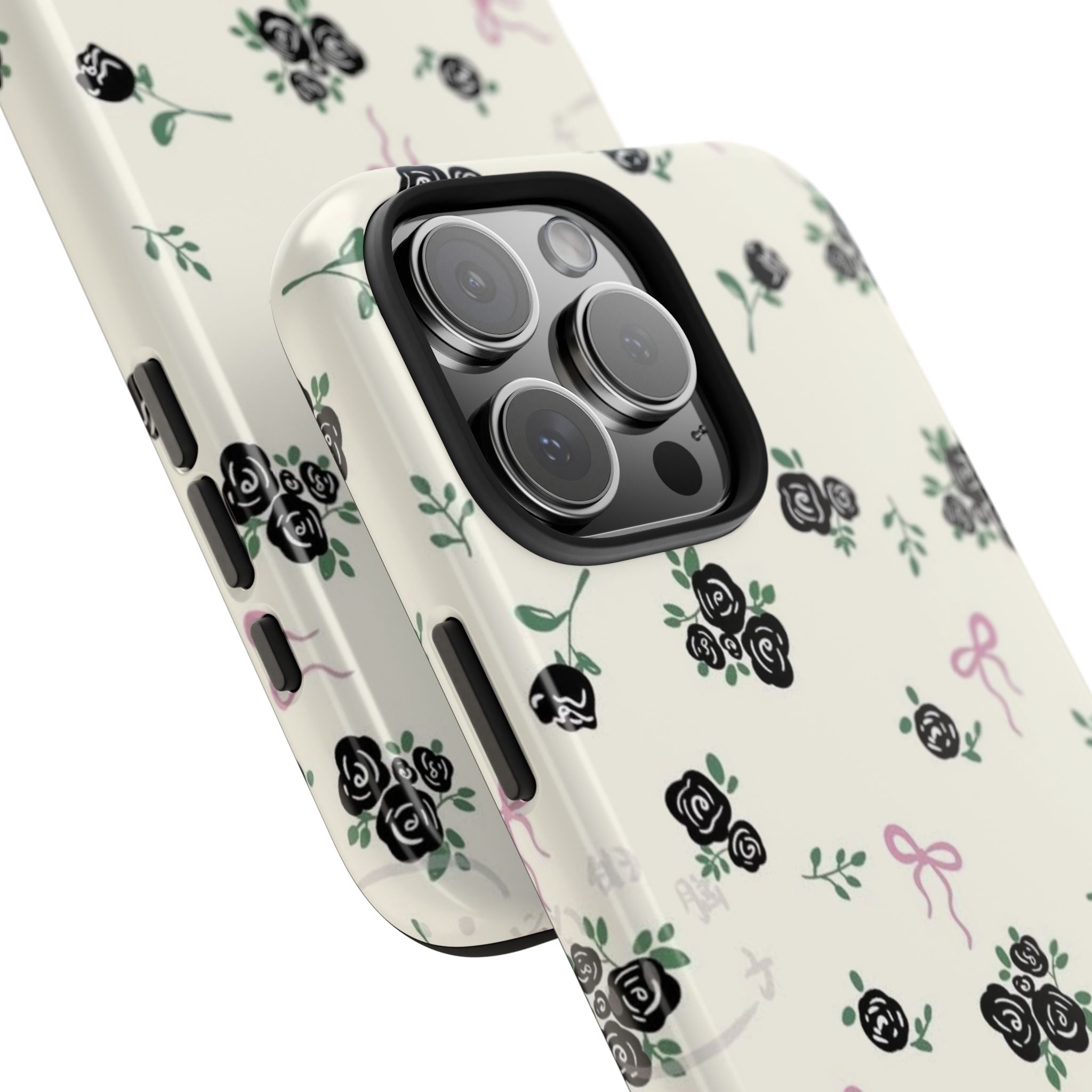 Close-up ivory phone case with rose-and-bow print and raised camera lens cover