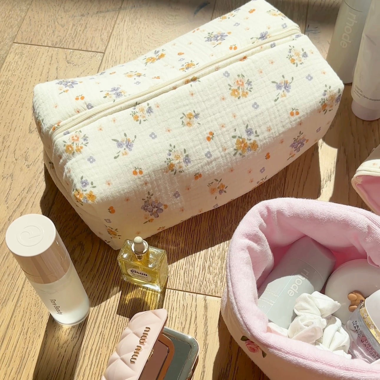Large ivory floral zippered pouch with small orange and purple flowers