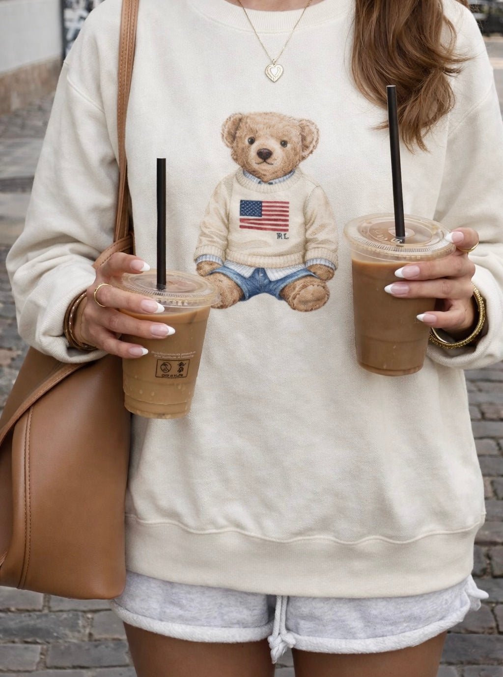 Ivory teddy bear crewneck sweatshirt, bear graphic centered on chest