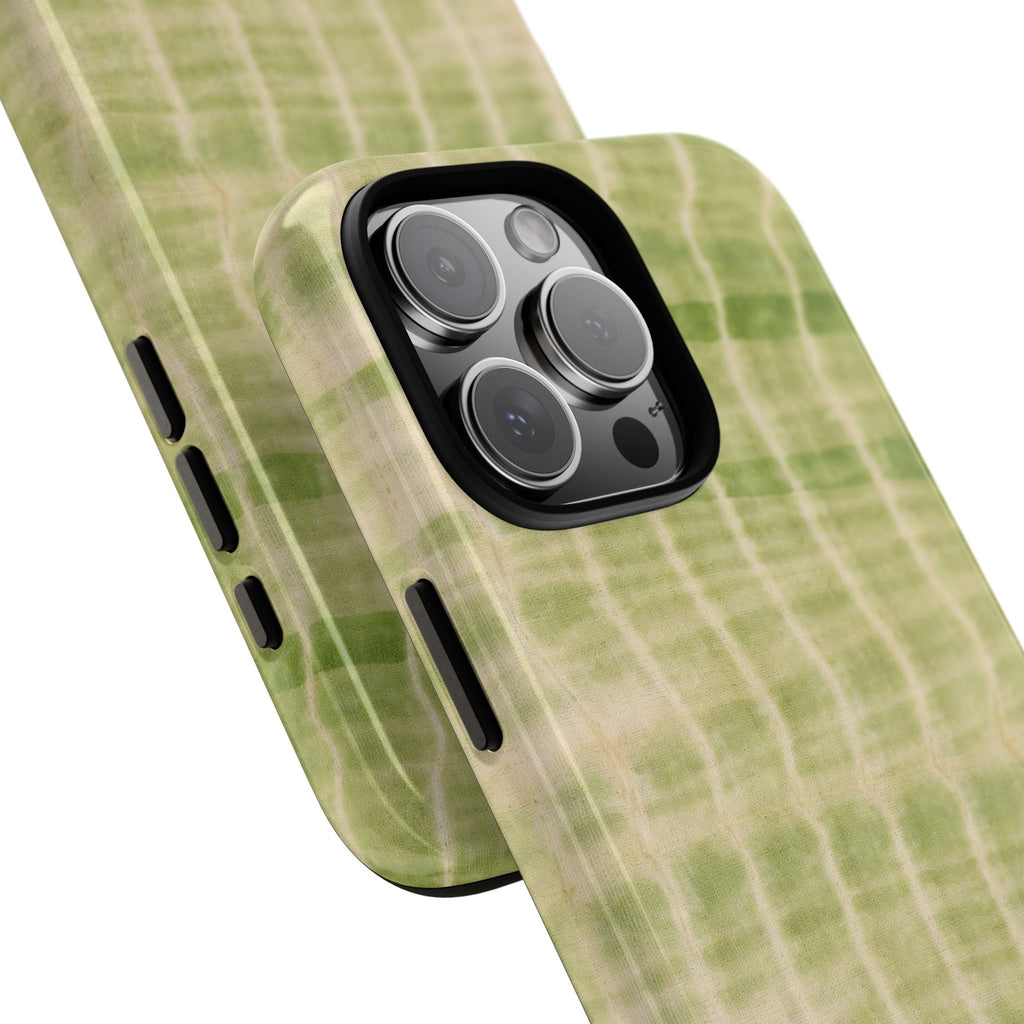 Kiwi green shibori tie-dye phone case, angled view showing side buttons and camera lenses
