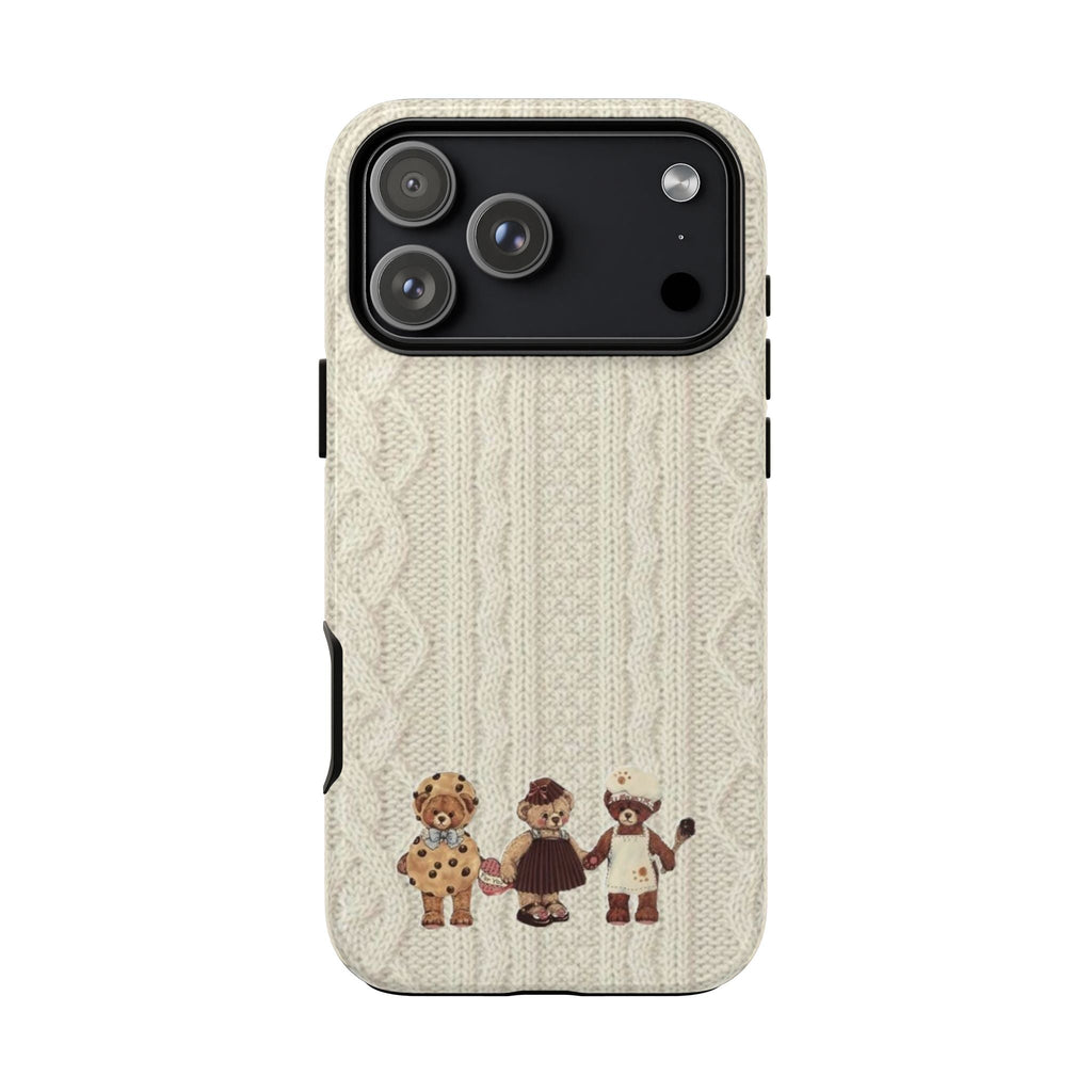 Cream knit phone case with teddy bear trio at bottom; side button cutouts