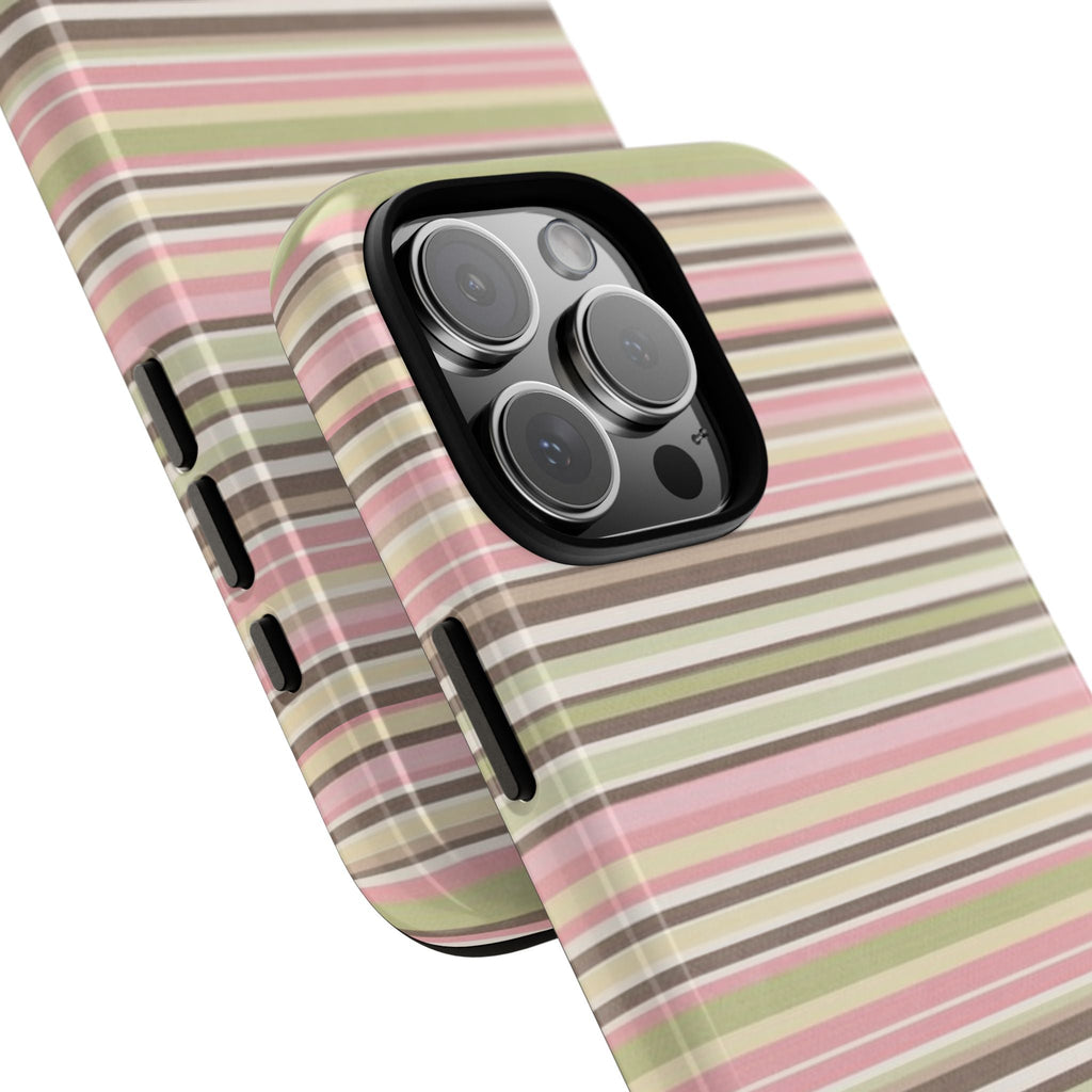 Striped phone cases close-up: pink, green, and tan horizontal stripes with raised camera