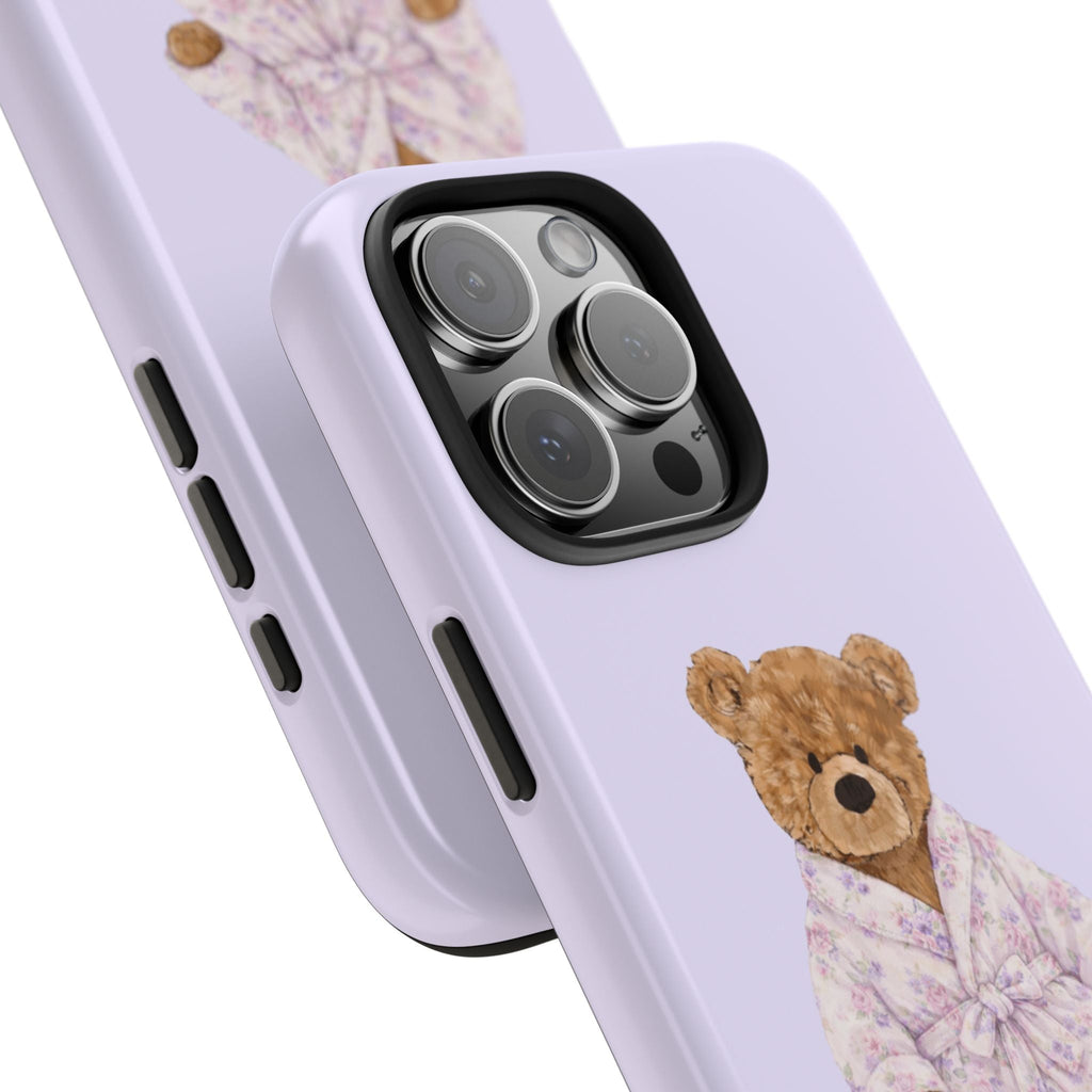 Lavender phone case close-up: teddy bear art with camera lens cutout