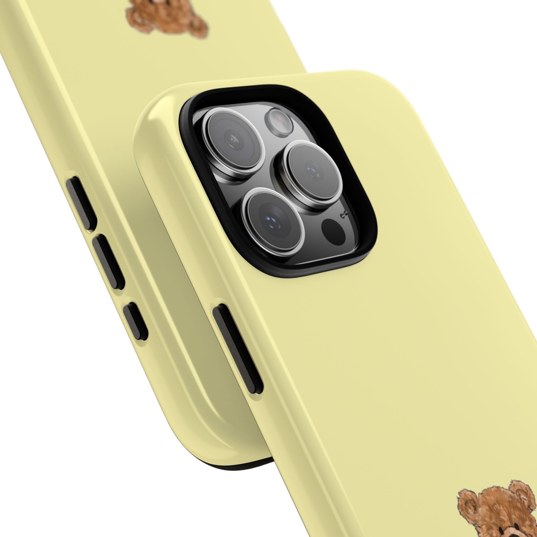 Close-up lemon yellow teddy bear phone case: camera lenses and side button cutouts