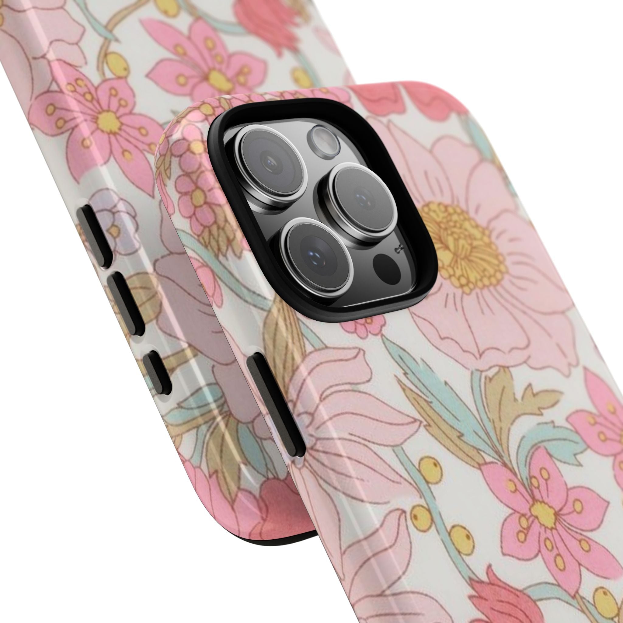 Close-up of liberty floral phone case corner with camera lenses and side buttons