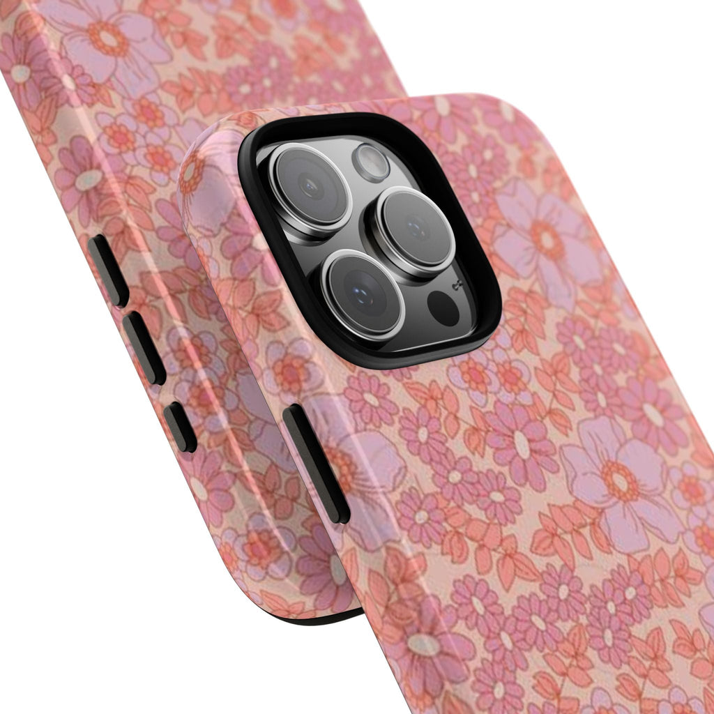 Minimal floral phone case, pastel pink blooms; angled view with camera bump cutout