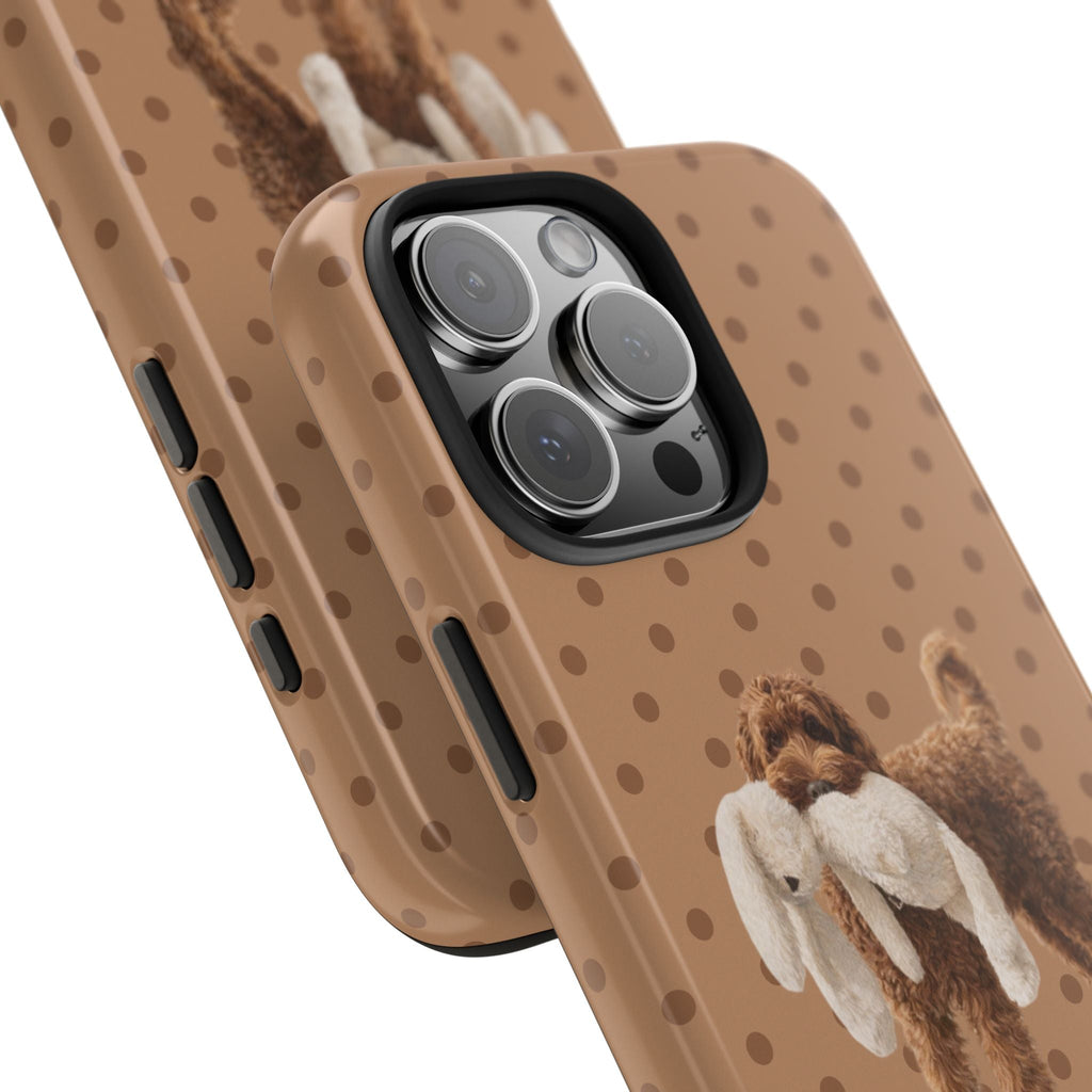 Polka dot phone case close-up with golden doodle graphic and camera cutout