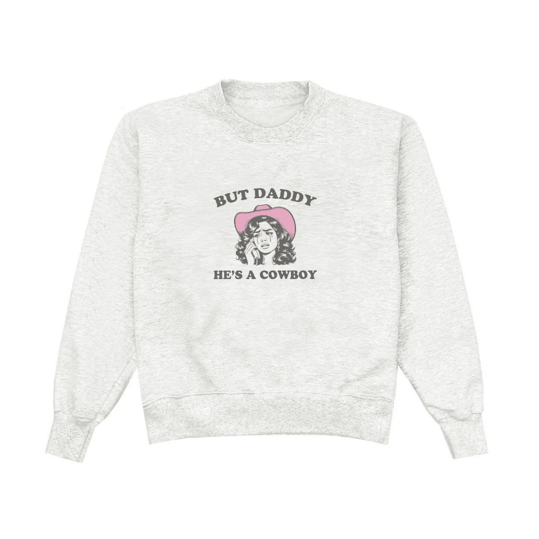 Light gray crewneck sweatshirt with cowboy hat graphic and 'But Daddy He's a Cowboy' text