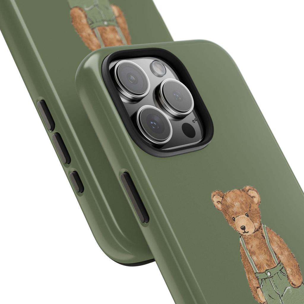 Light green case close-up: teddy bear motif near bottom and raised camera protection