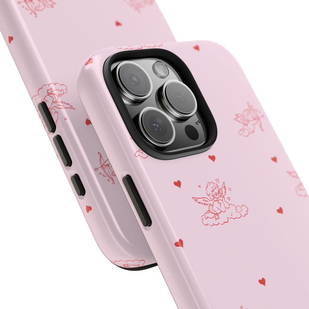 Close-up of light pink minimalist cupid phone case: camera lenses, cutout ports, heart motifs