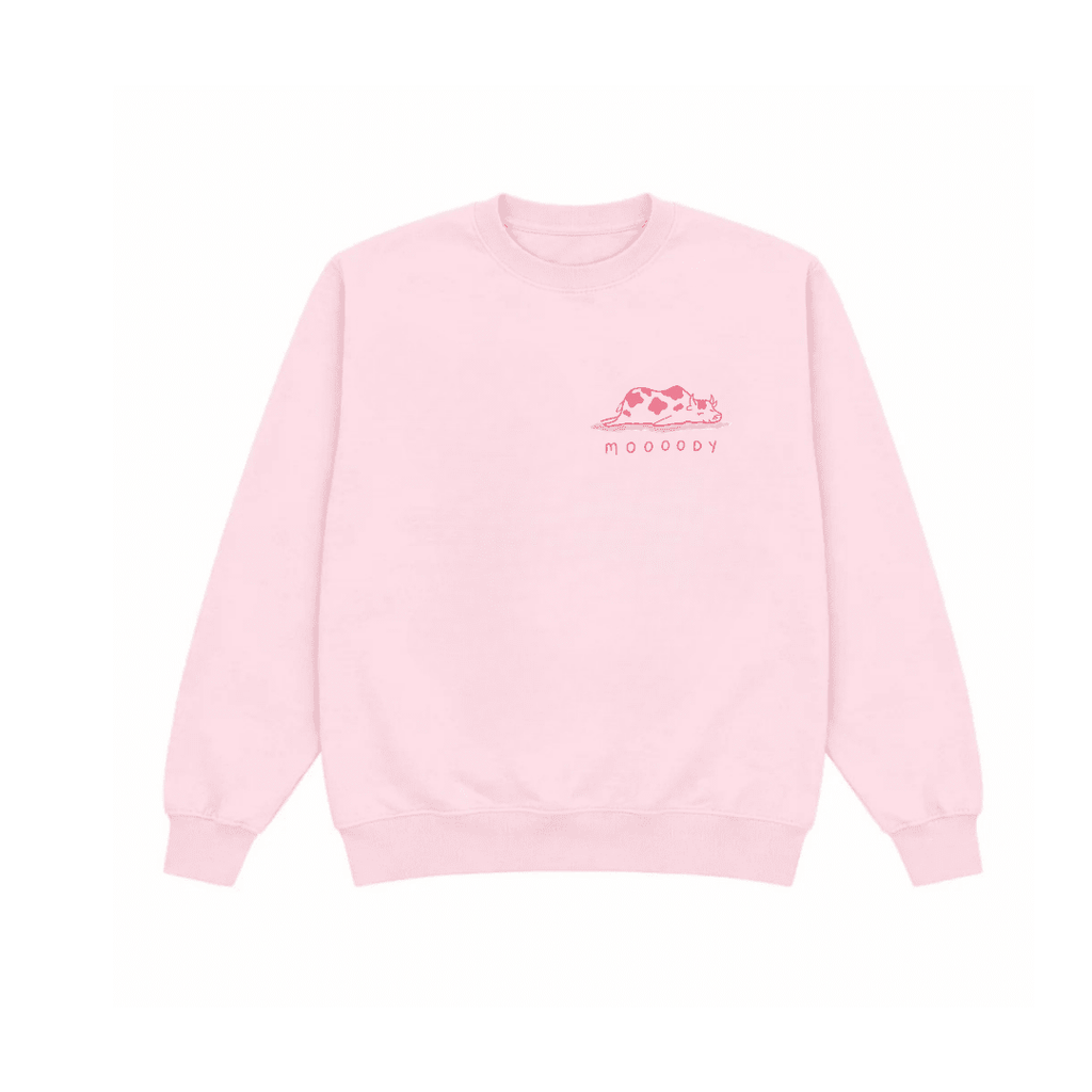 Light pink crewneck sweatshirt, long sleeves, small pink cow logo at chest