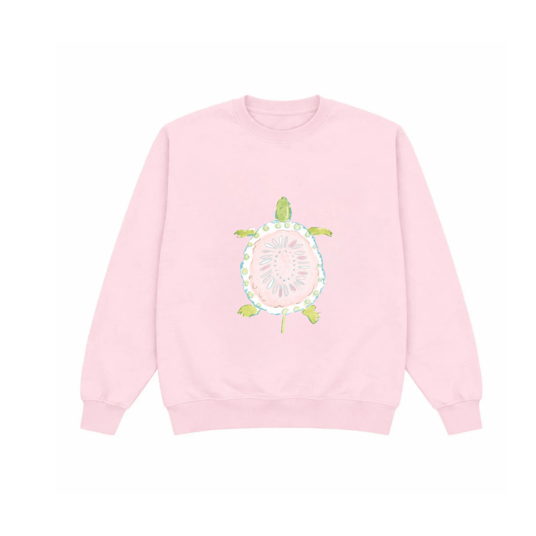 Light pink crewneck sweatshirt with turtle graphic