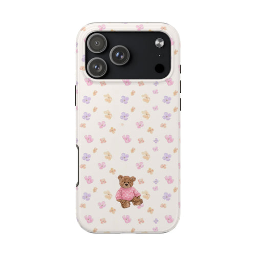 Light phone case with pink teddy bear graphic and multicolor flower paw prints