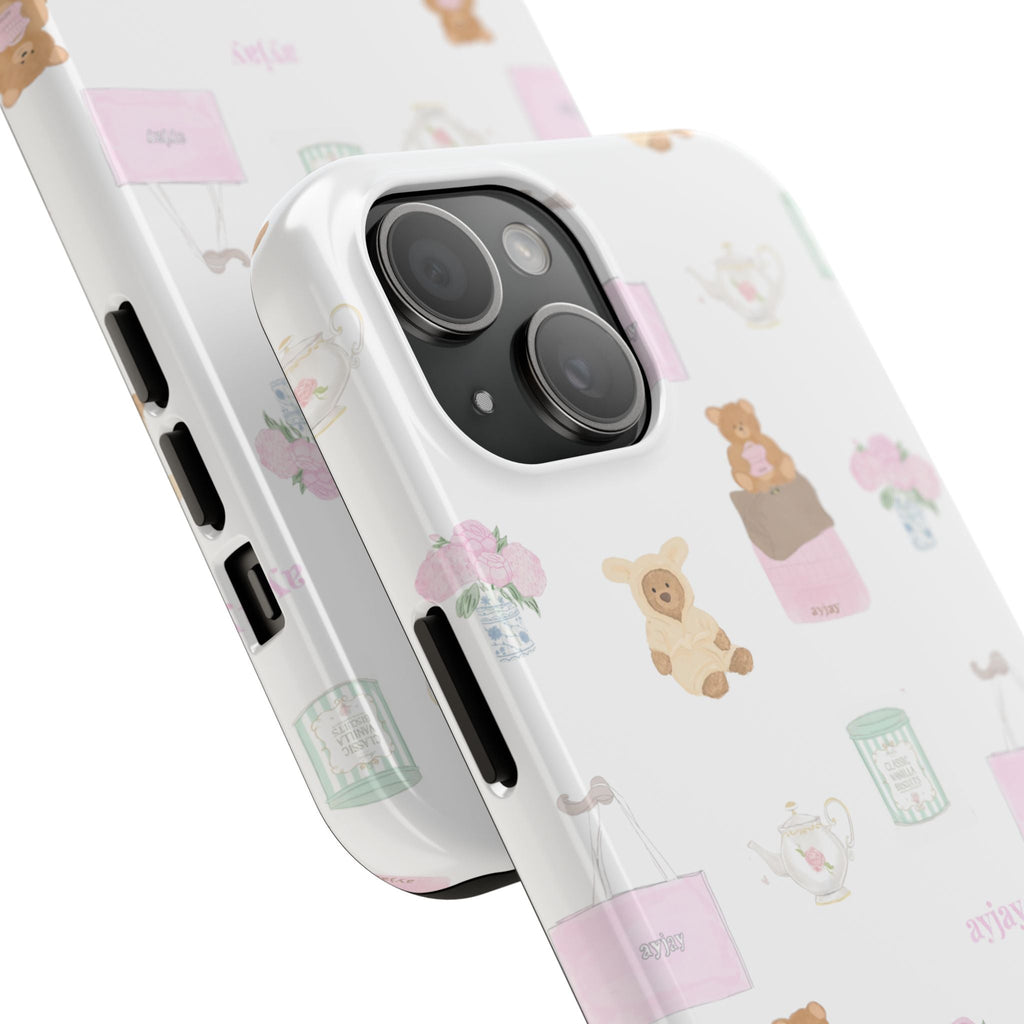 Angle view white phone case with teddy pattern and side button openings