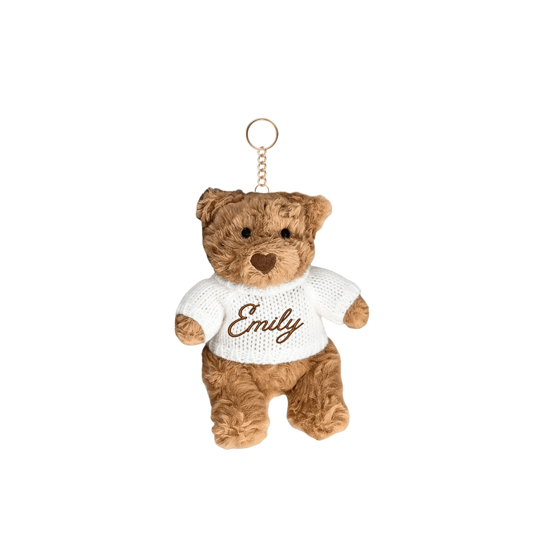 Teddy bear keychain bag charm with white sweater embroidered 'Emily' and gold-tone key ring