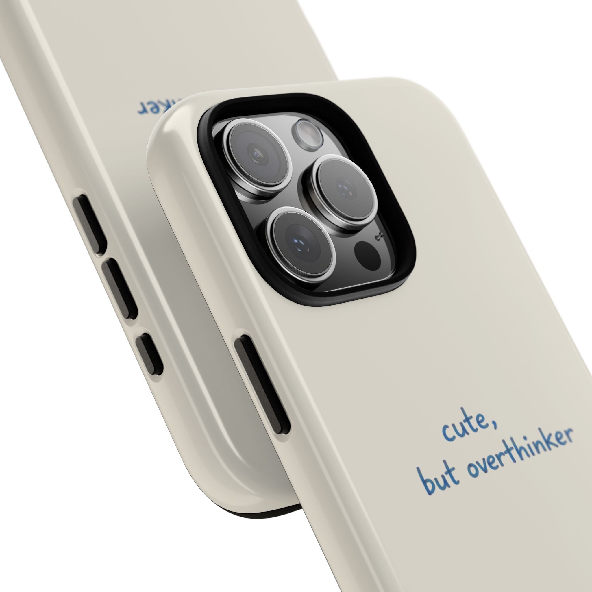Cream phone case angled view with “cute, but overthinker” text and lens openings