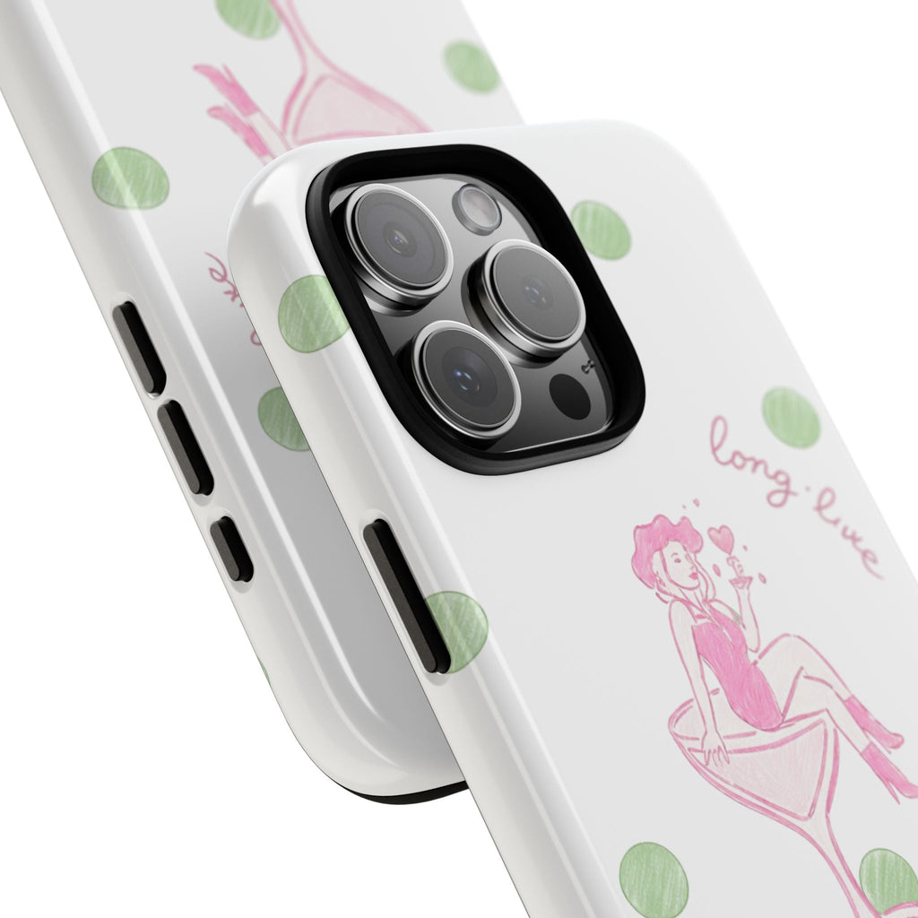 Angle view: white phone case with green dots, pink cocktail art, camera cutouts and side buttons