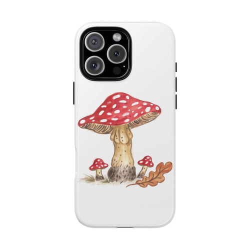 White phone case with red polka-dot mushrooms illustration and leaf accents
