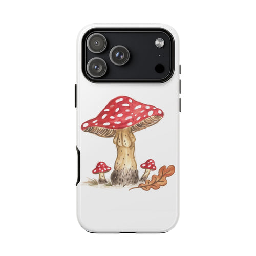 White phone case with red polka-dot mushroom art beneath the camera cutout