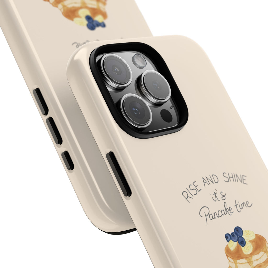 Beige phone case corner close-up with triple camera cutouts and pancake time text