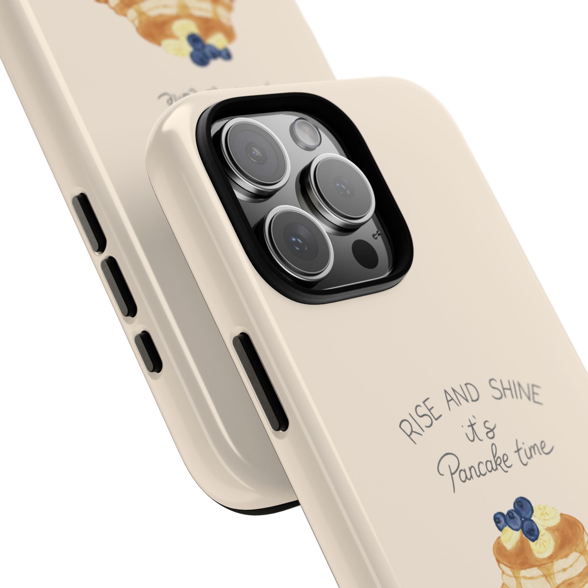 Beige phone case corner close-up with triple camera cutouts and pancake time text