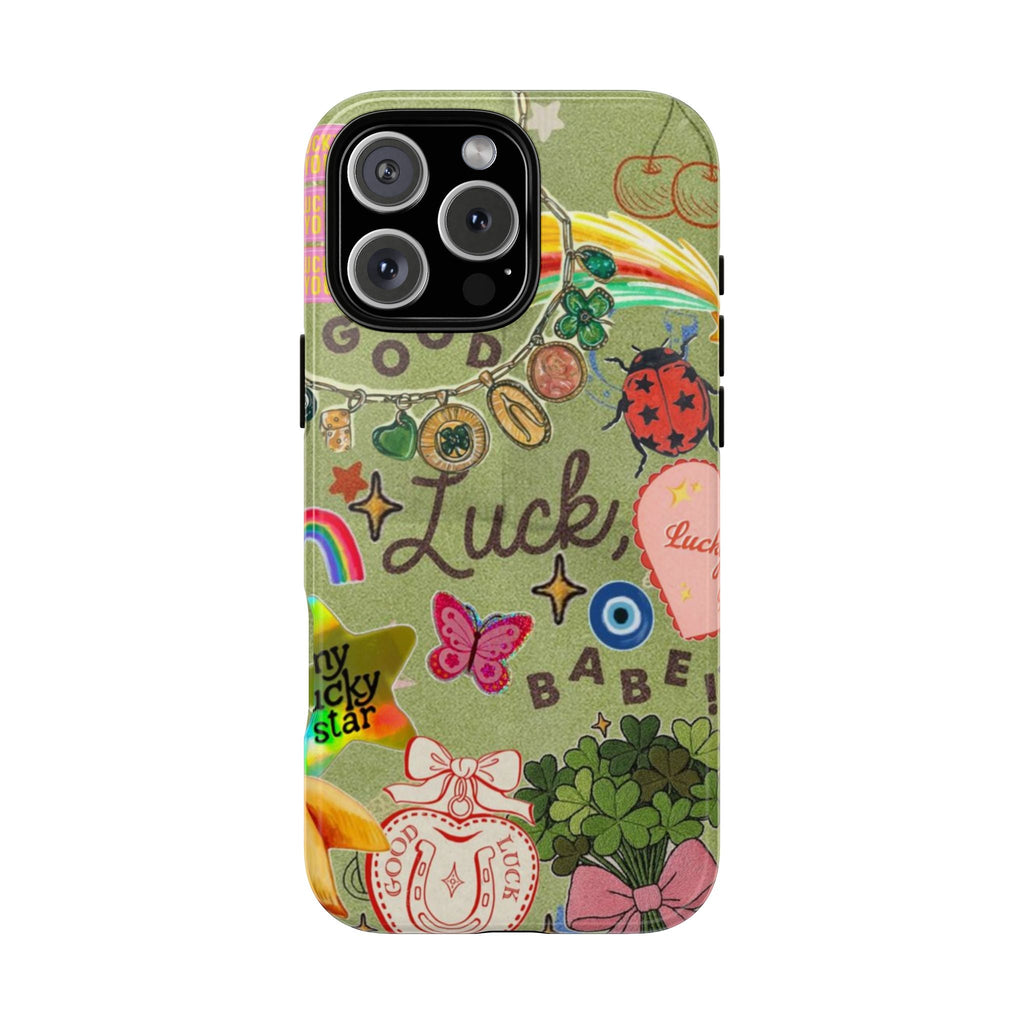 Luck-themed phone case with colorful charm, rainbow, butterfly and clover graphic on green