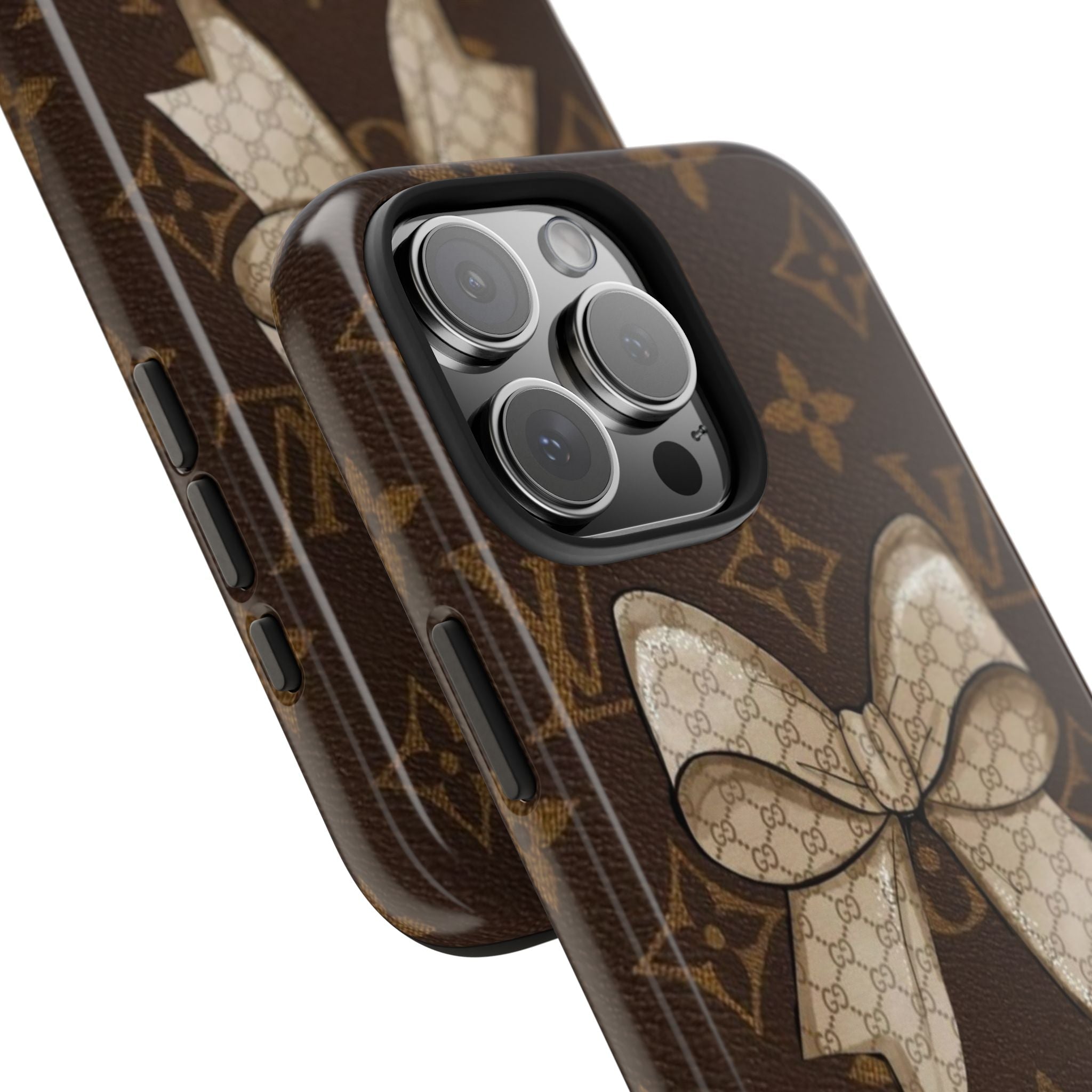 Brown monogram phone case with cream bow detail and camera cutouts on back