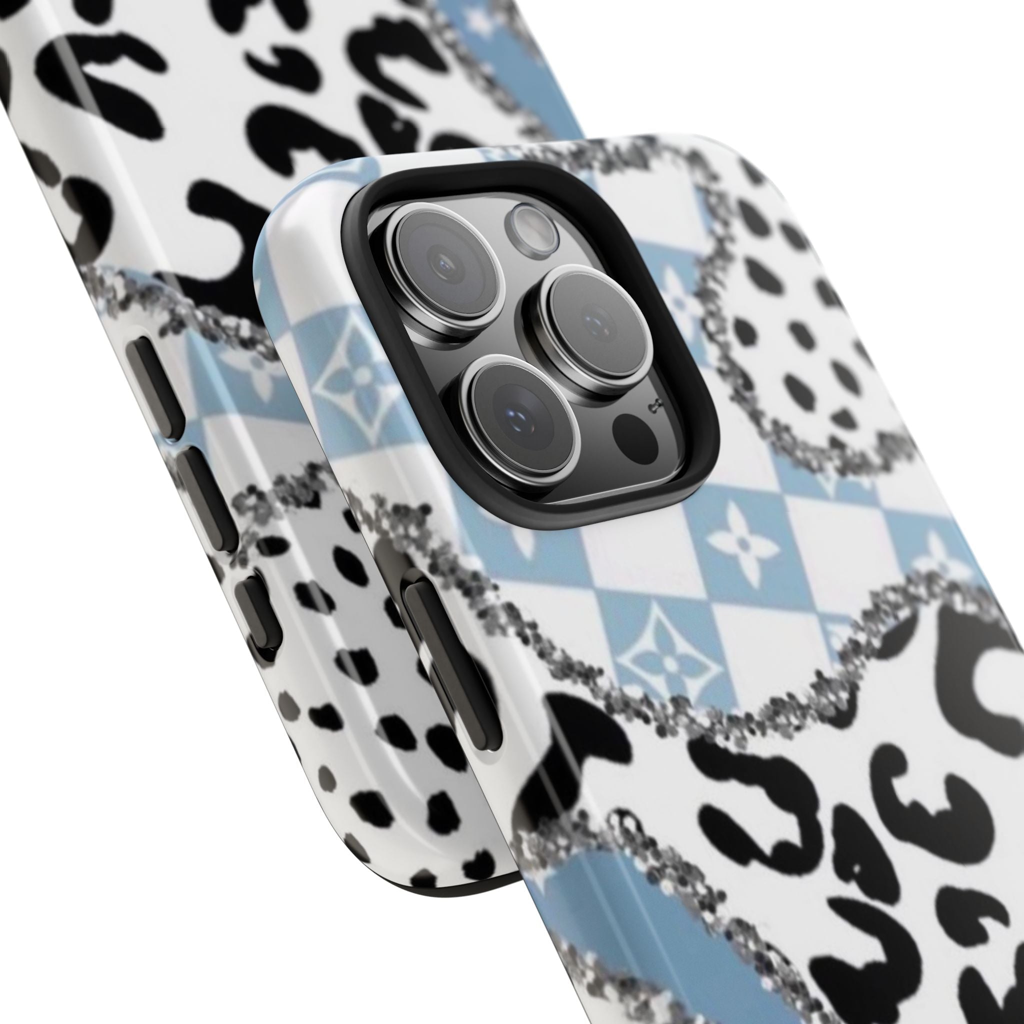 Phone case corner view: icy blue tiles, black leopard print, and rhinestone chain trim