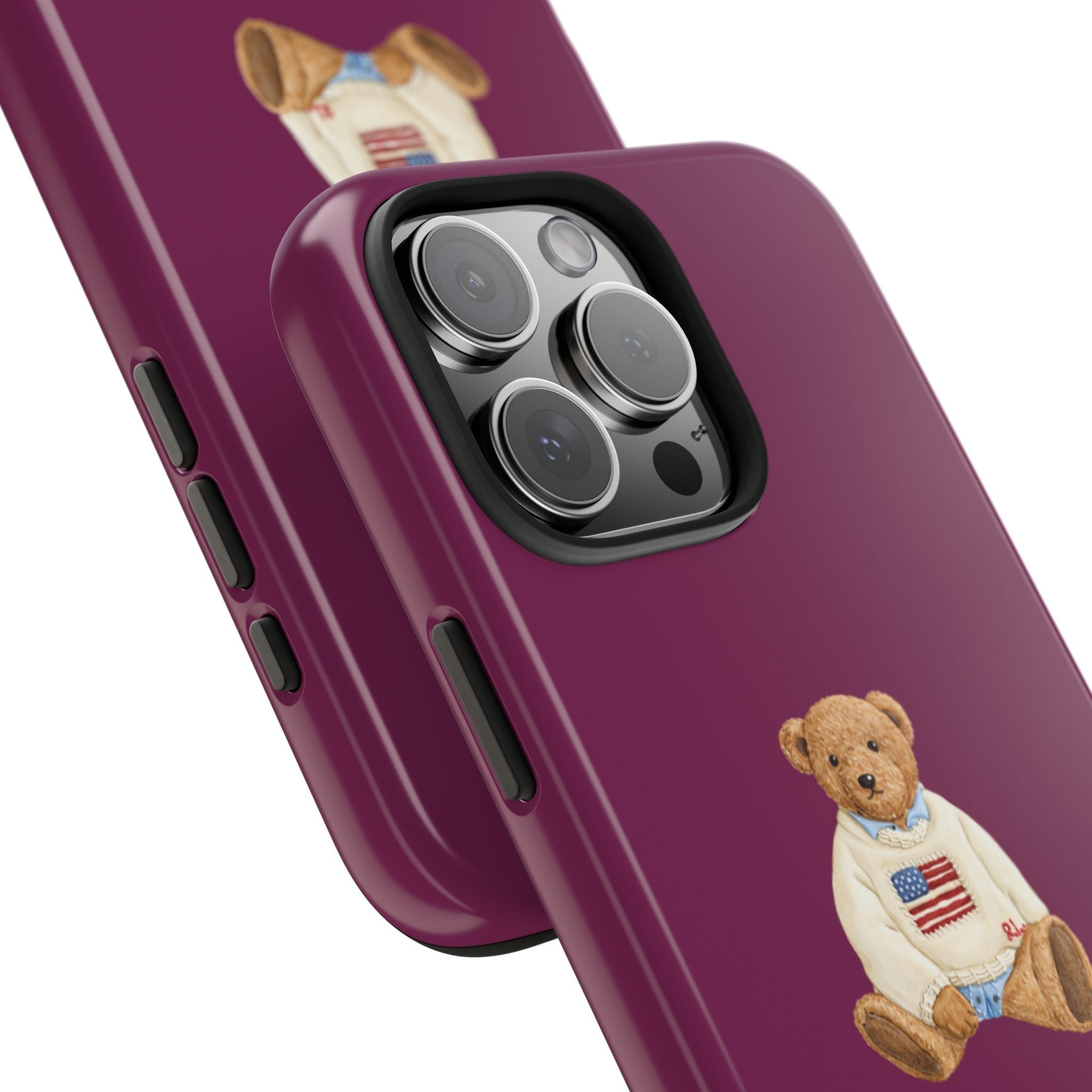 Magenta phone case detail: camera lens cutout with teddy bear graphic on back