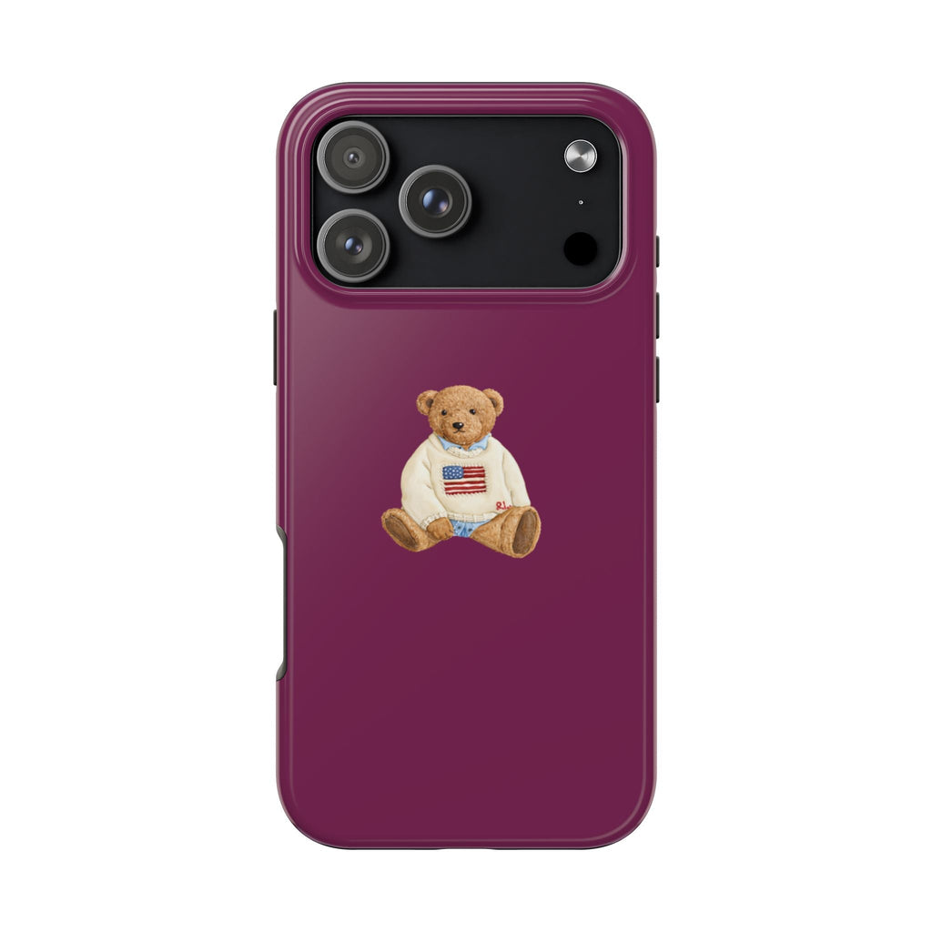 Magenta phone case, teddy bear in U.S. flag outfit on back, camera cutouts