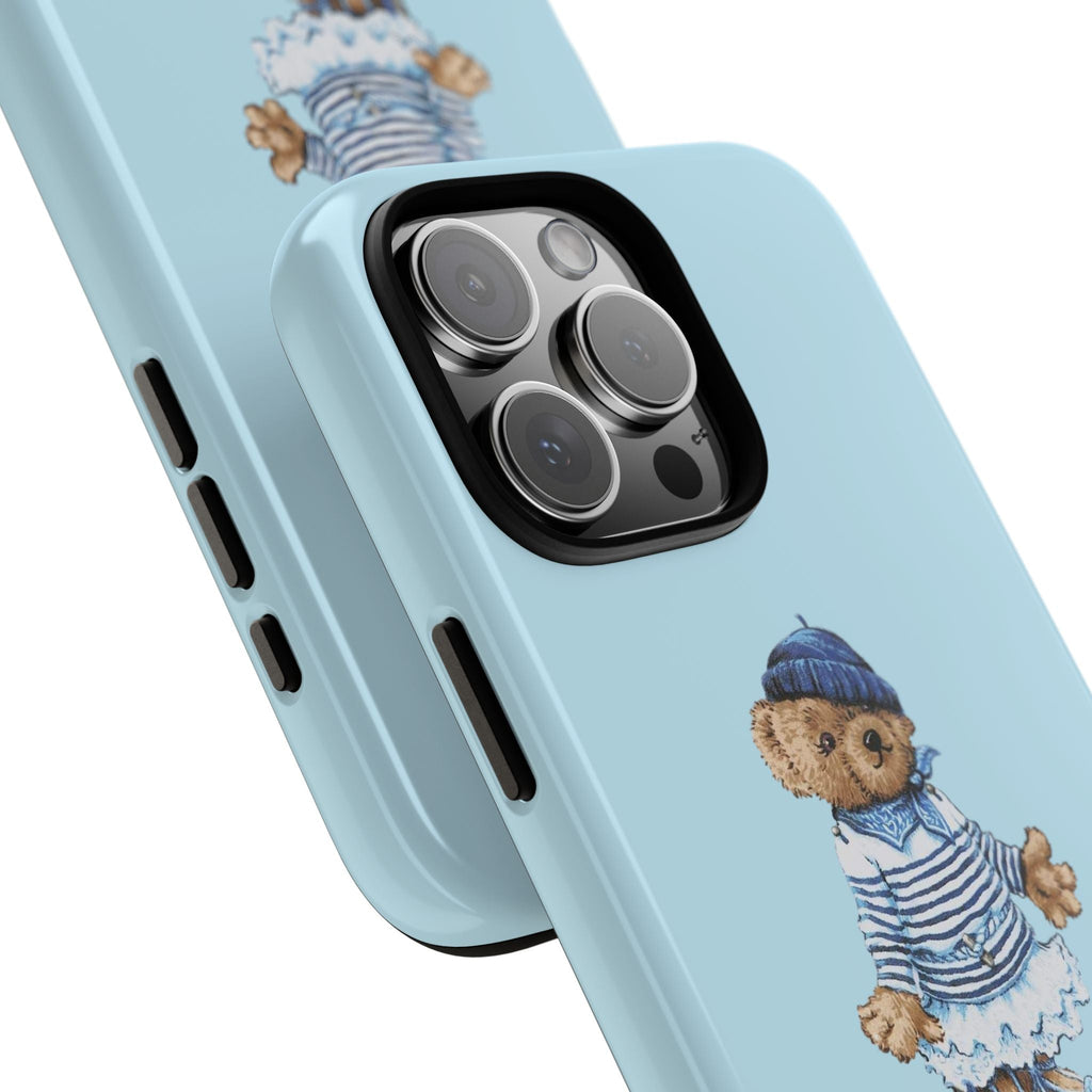 Light blue phone case detail: sailor teddy bear on back with camera lenses and side buttons