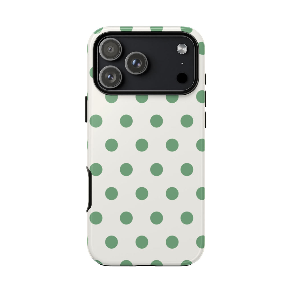Cream phone case with green polka dots and camera lens openings, rear view