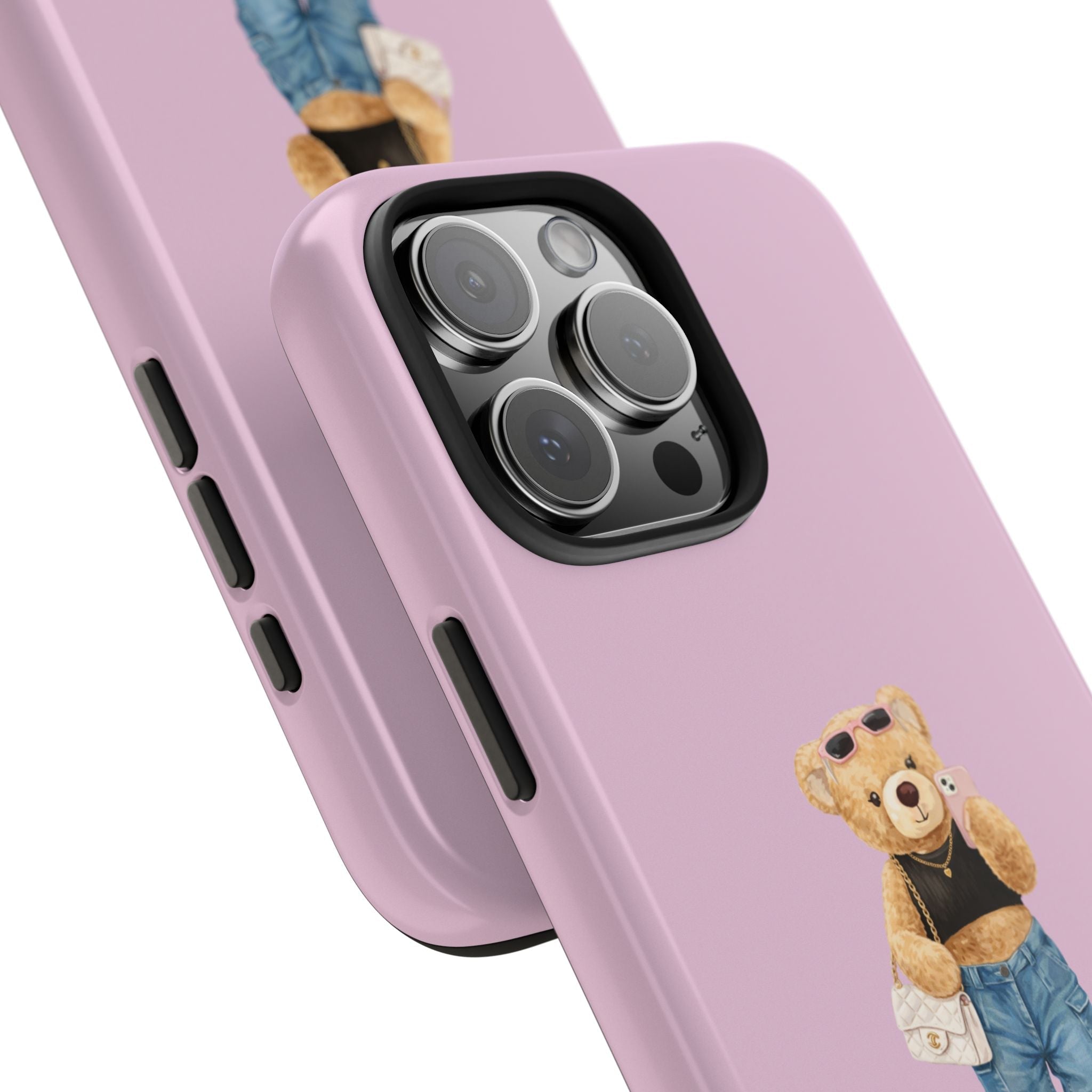 Mauve/pink teddy bear phone case close-up with camera lenses and side button cutouts