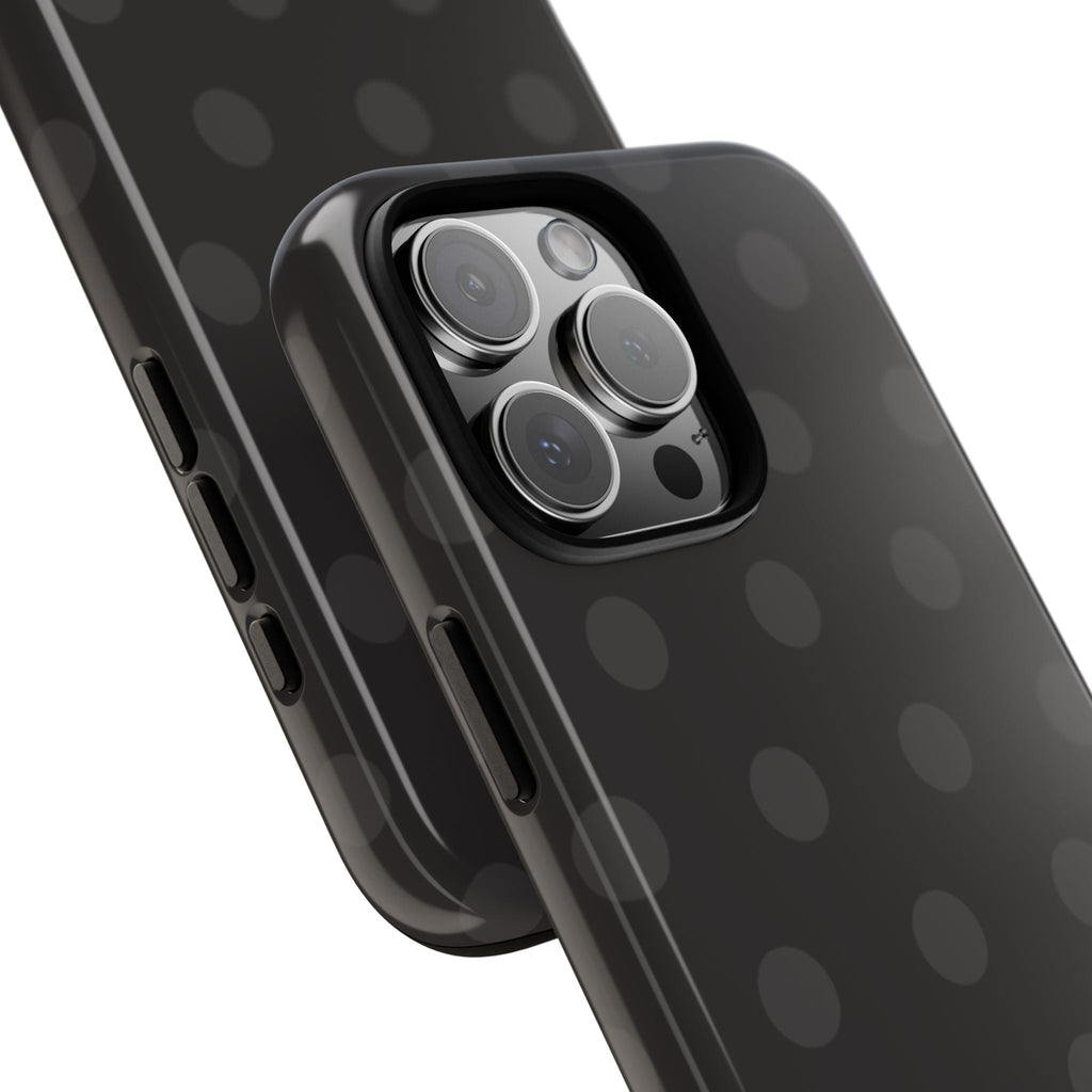 Close-up of midnight polka dot phone case showing camera lenses and side buttons