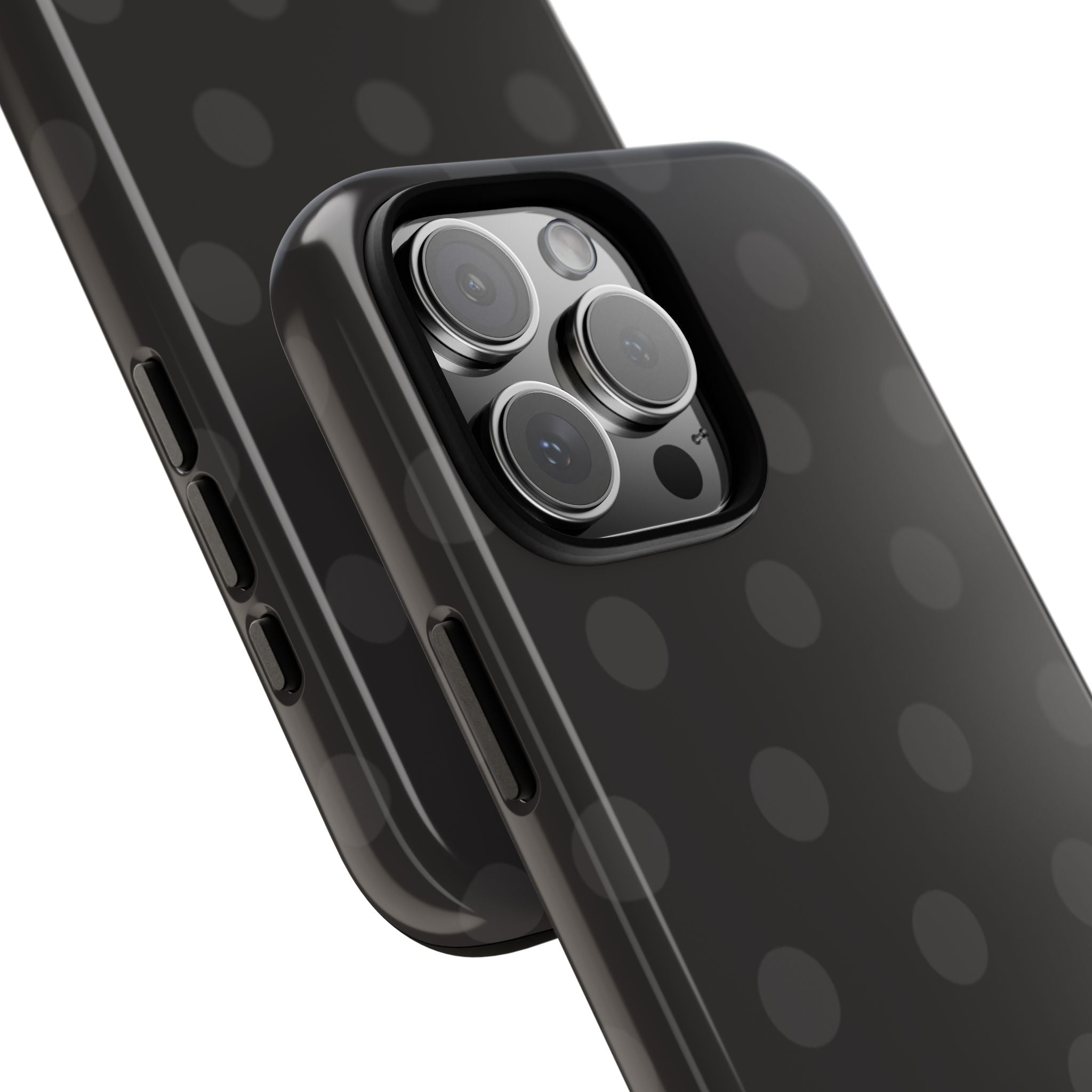 Close-up of midnight polka dot phone case showing camera lenses and side buttons