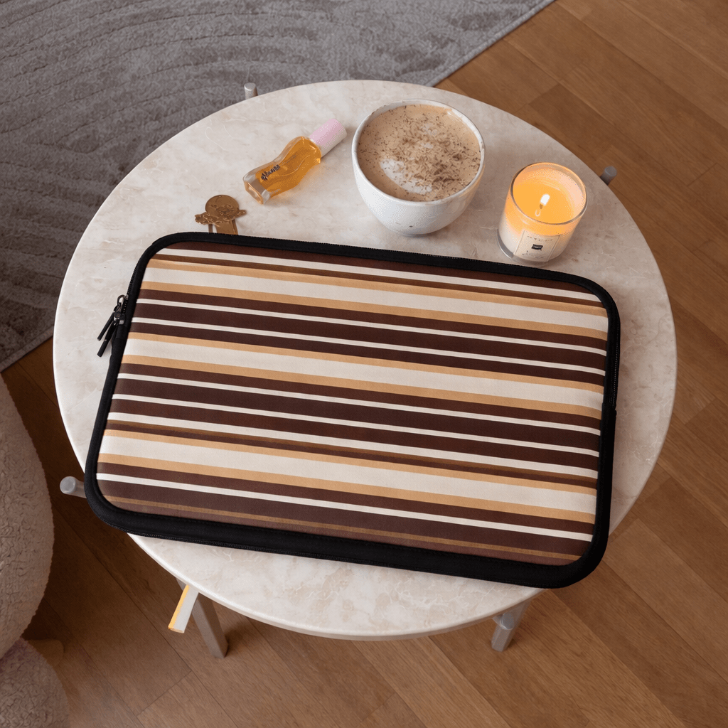Striped neoprene tablet & laptop sleeve with black zipper trim, angled view