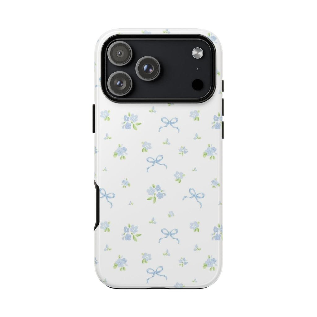 White MINI COQUETTE phone case with blue floral bows; cutouts for camera and ports
