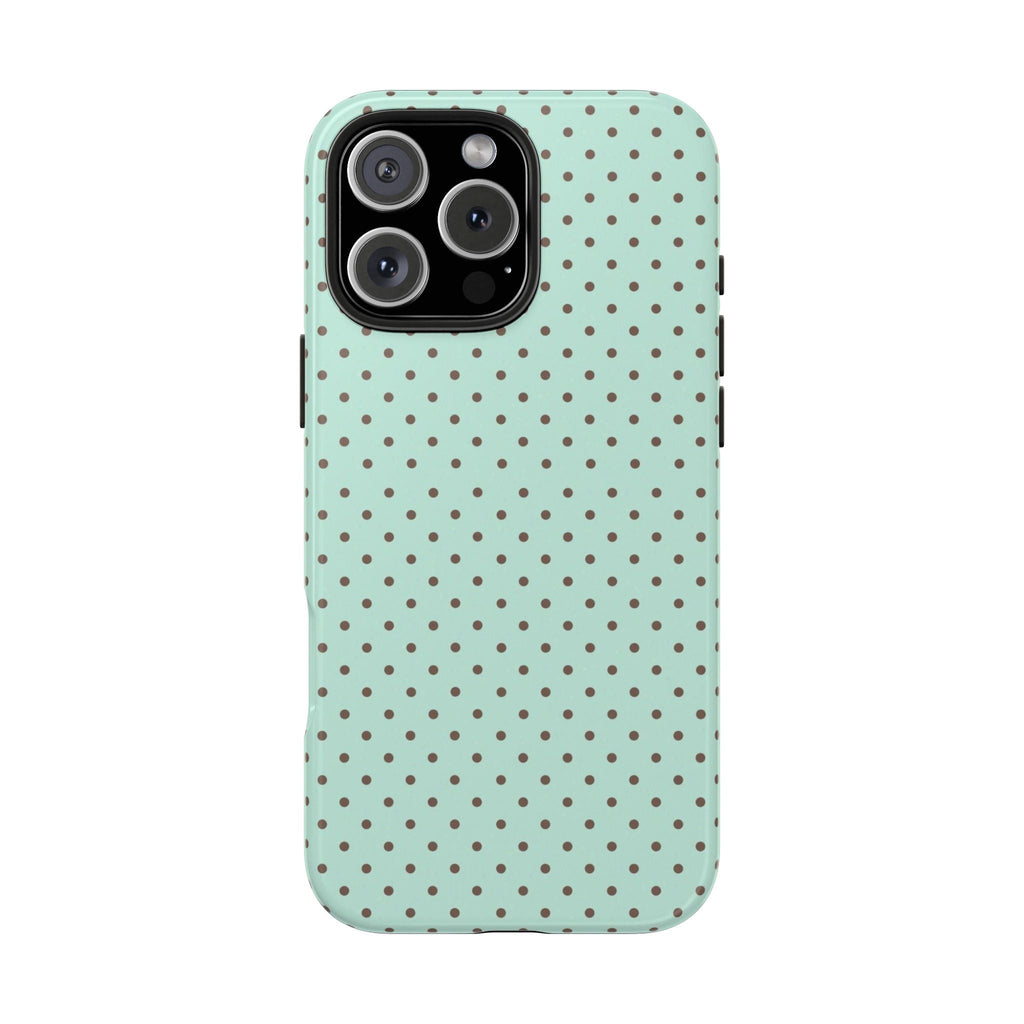 Mint green polka dot phone case with small brown dots; clear camera opening on back