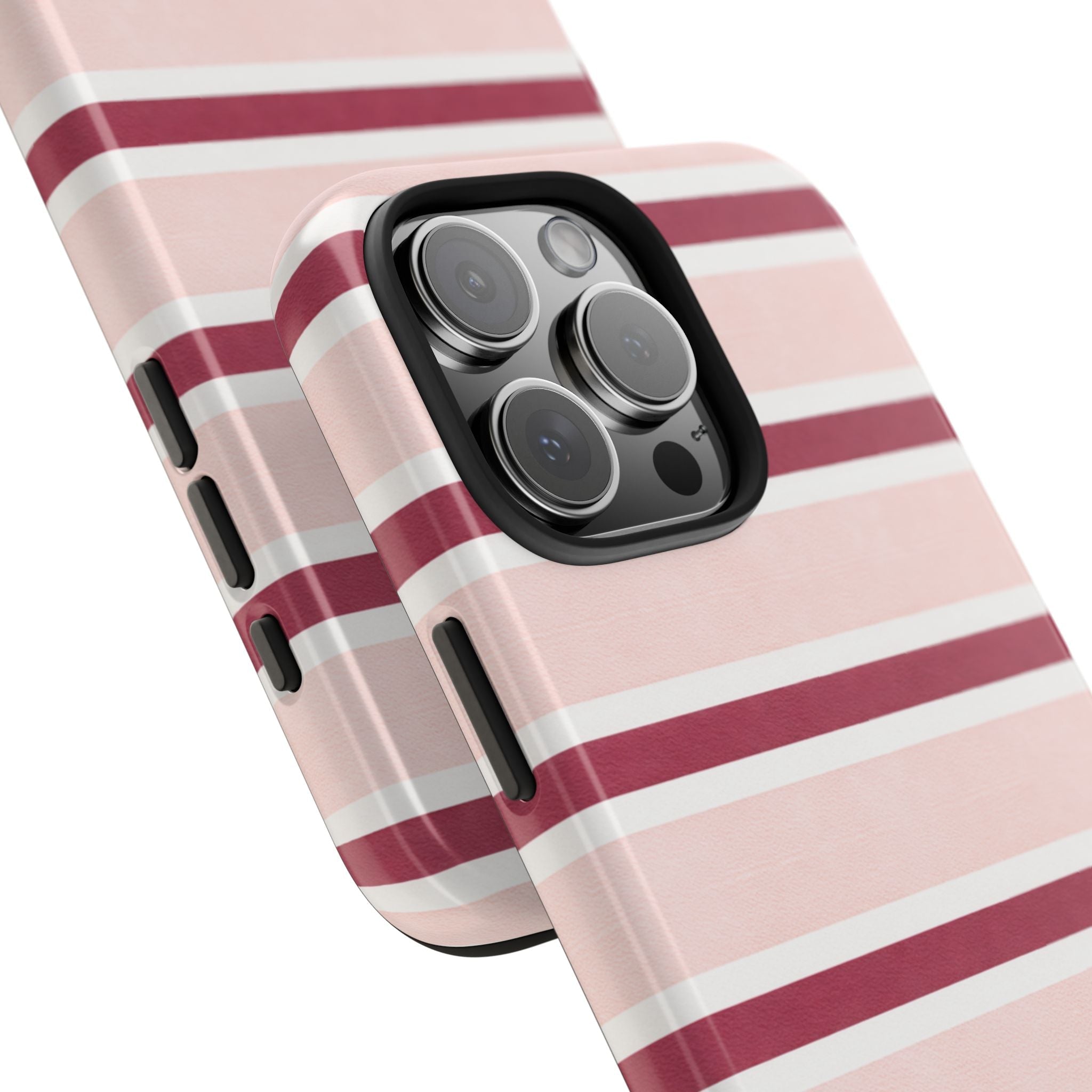 Pink striped phone case corner view with side button slots and raised camera guard