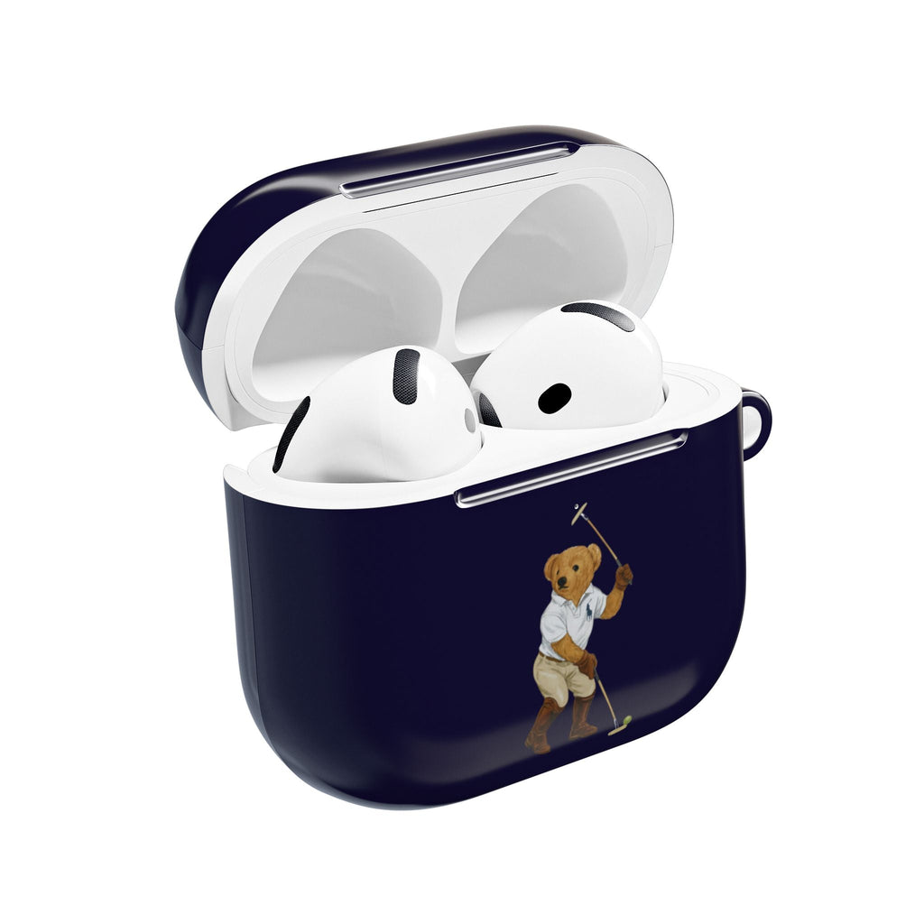 Navy AirPods case with open lid; teddy bear golfer graphic; holds white earbuds