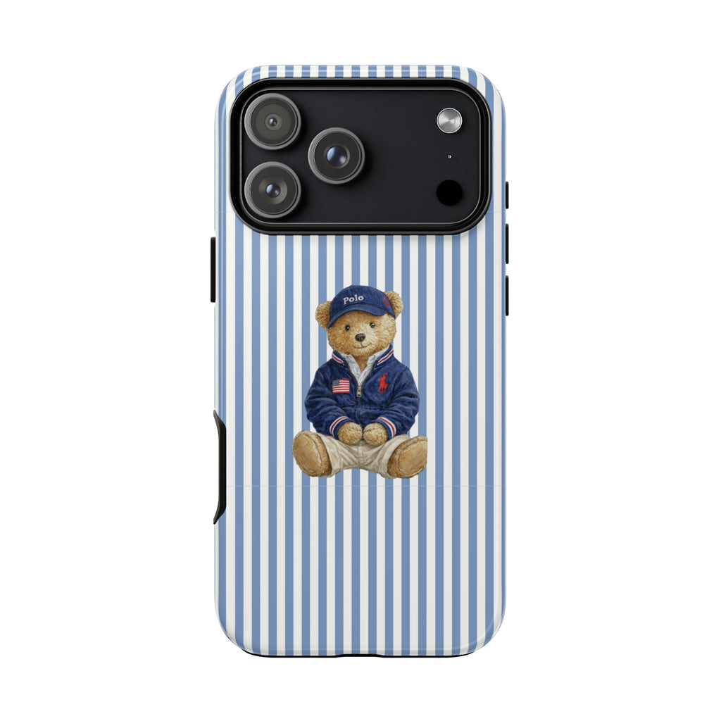 Blue-and-white striped phone case with teddy bear in navy polo, front view