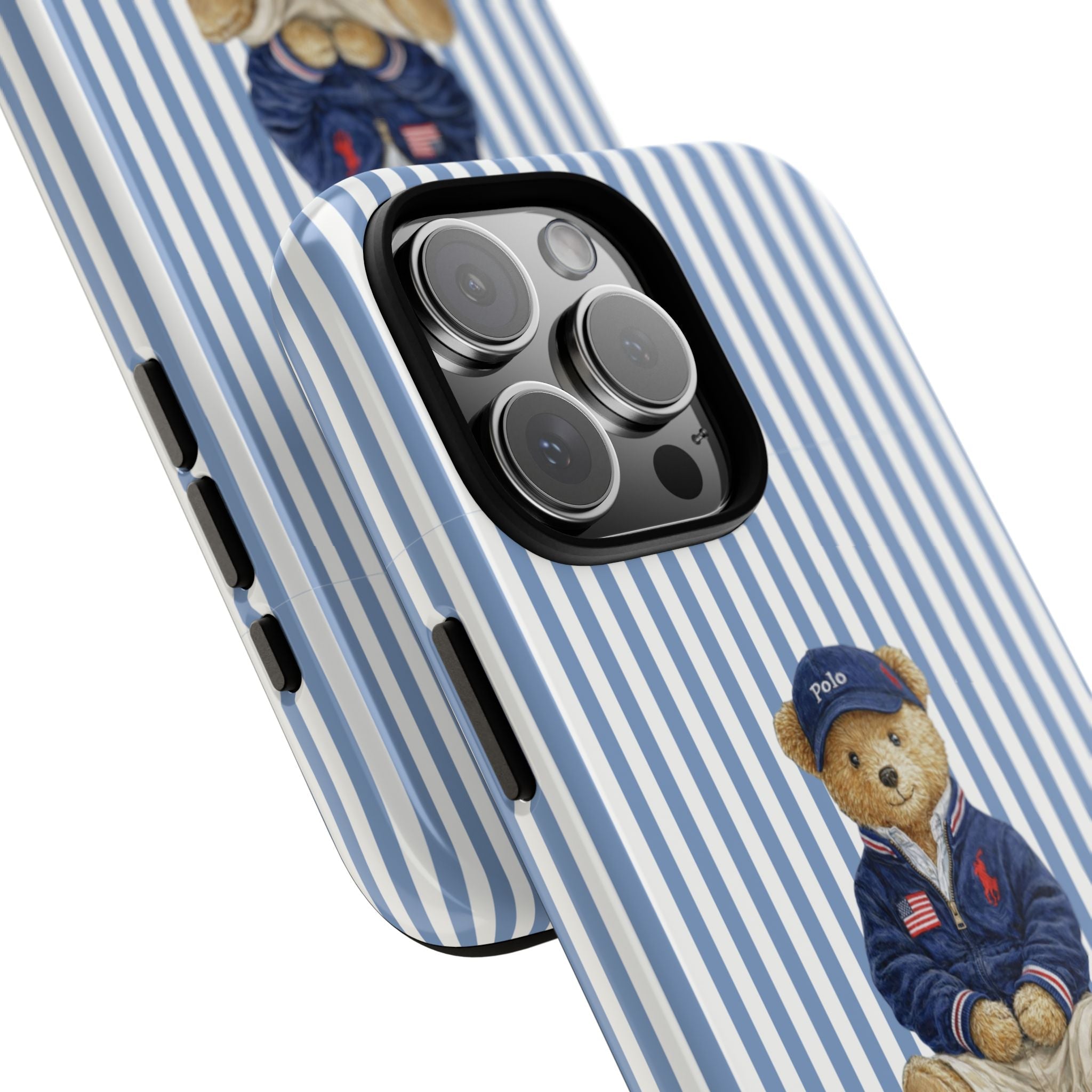 Blue-and-white striped case with teddy bear in navy polo and camera lens openings