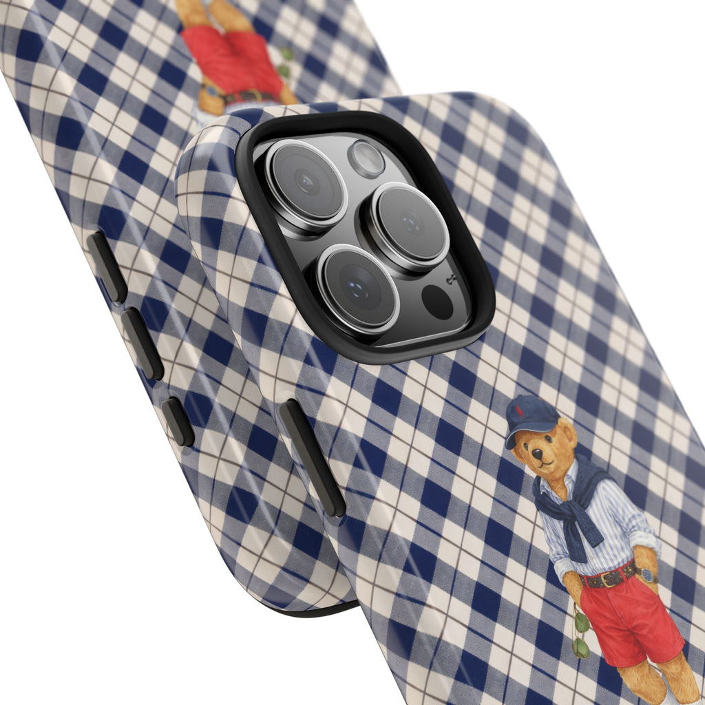 Checkered case with teddy bear motif; raised camera bump and side buttons