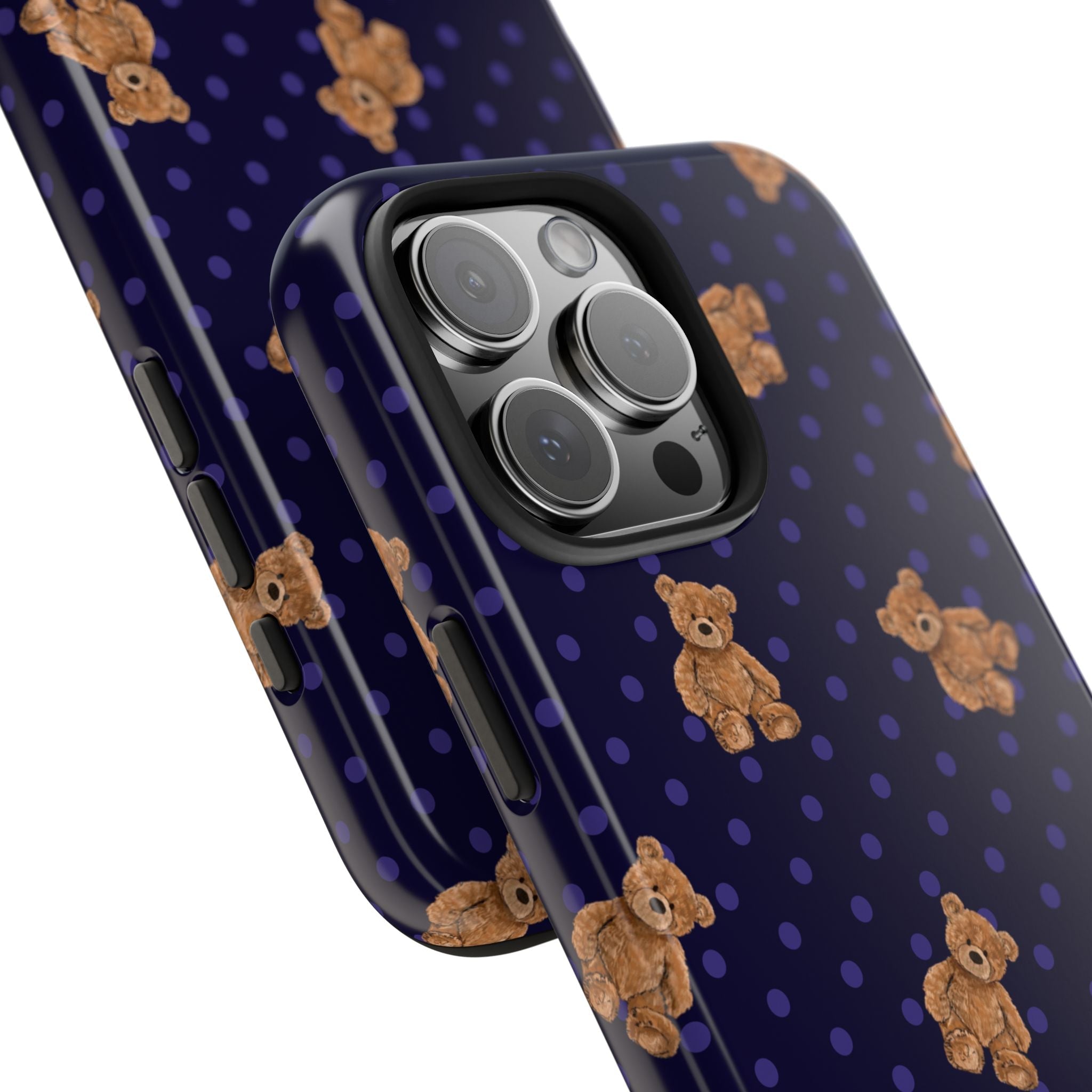Navy polka-dot phone case with teddy bears, visible side buttons and camera lenses