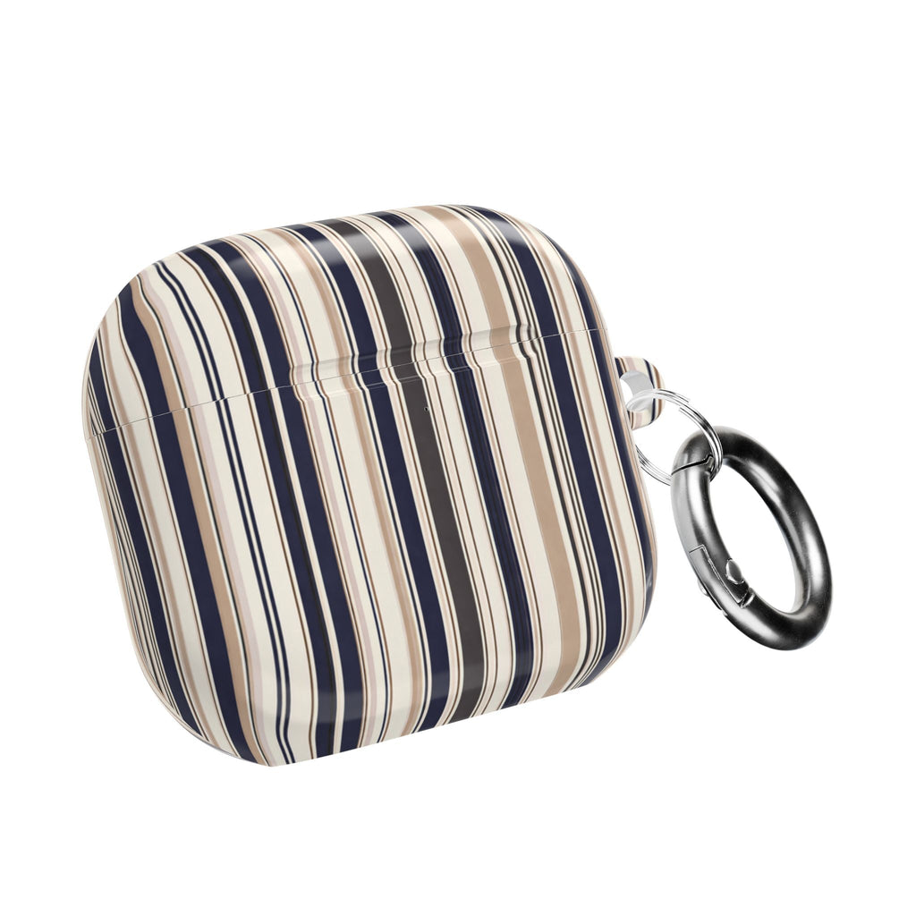 Striped AirPods case closed with navy and tan vertical stripes and metal carabiner ring